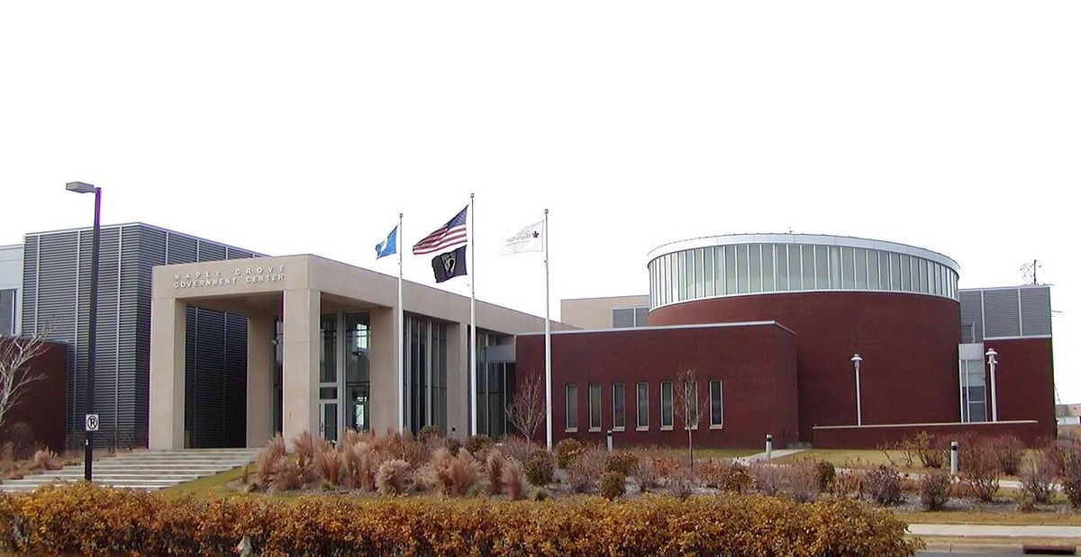 Maple Grove Government Center, with flags flying at the entrance